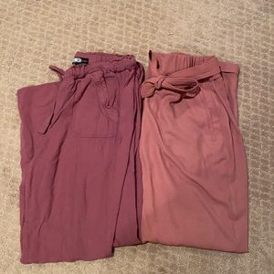 Two pairs of mauve slacks size medium
